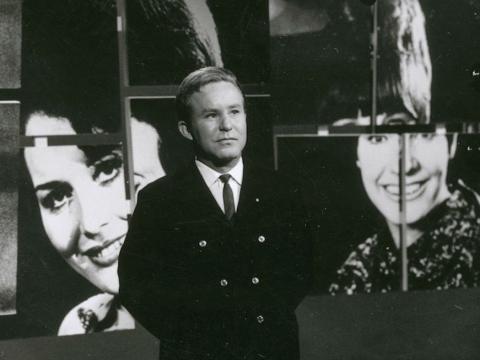 Johnny O'Keefe with boom mic and camera on set
