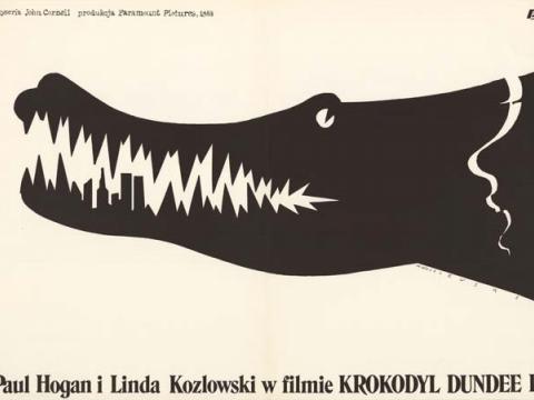 Black and white Polish poster for Crocodile Dundee II featuring the head of a crocodile. Some of the crocodile's teeth are shaped like the New York skyline.
