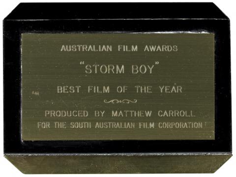 Close up of the plaque of an AFI award won by Storm Boy in 1977. It reads: 'Australian Film Award, "Storm Boy", Best Film of the Year, Produced by Matthew Carroll for the South Australian Film Corporation'.