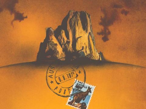 Detail from a Czech film poster for Wake in Fright featuring an Australian postage stamp and a mountain against an orange backdrop