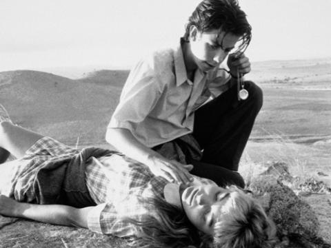 Noah Taylor as Danny trying to hypnotise Loene Carmen as Freya on Willy Hill.