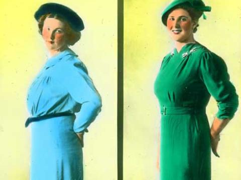 A side-by-side comparison of a woman dressed in two different dresses and hats. The slide is hand-coloured with a yellow background.