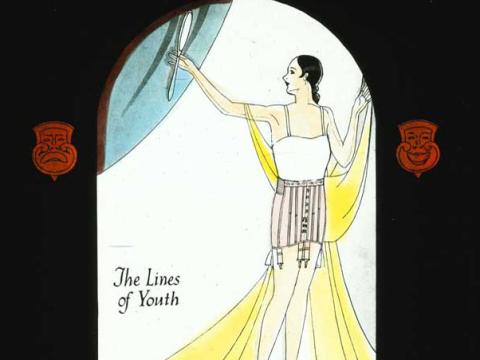 Hand-coloured glass slide image of a woman in a foundation garment. It includes art deco imagery such as an arched border and line work.
