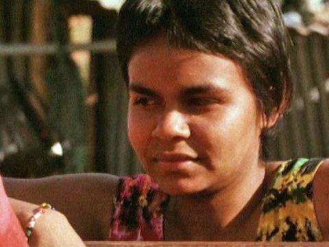 Close up shot of young woman Della (Urshula Yovich)