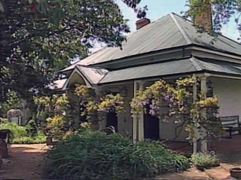 View of the front entrance of an old heritage listed house in the town of Bathurst.
