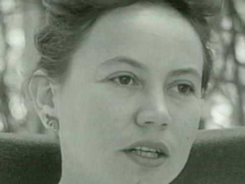 Merle Thornton is being interviewed in this black and white close-up still.