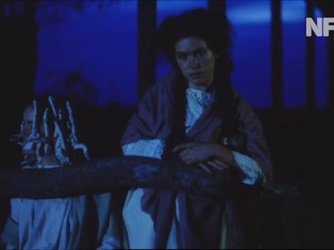 Sybylla Melvyn (Judy Davis) and her younger sister Gertie (Marion Shad) outside at night