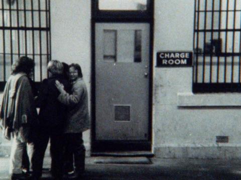 Several lesbian activists embrace outside the police station after being arrested during the first Mardi Gras march in 1978