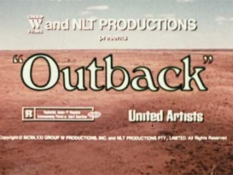 Film title reading 'Outback' in front of a red desert