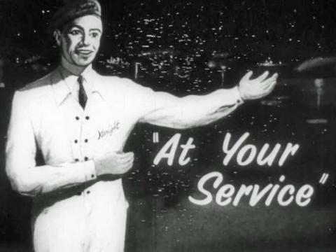 Graphic of a bus boy with arm extended and the words 'At Your Service'