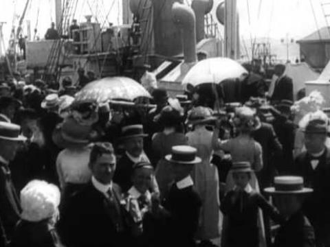 A crowd of people farewell the ship 'Aurora' bound for Antarctica. 
