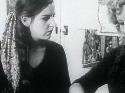 Jeni (Jeni Thornley) chats to her mother (Joan Janson) while they wash the dishes