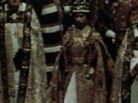 Queen Elizabeth II at her Coronation with members of the Church around her