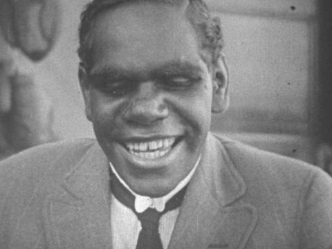 Jimmy Cook (Sandy McVea) smiling
