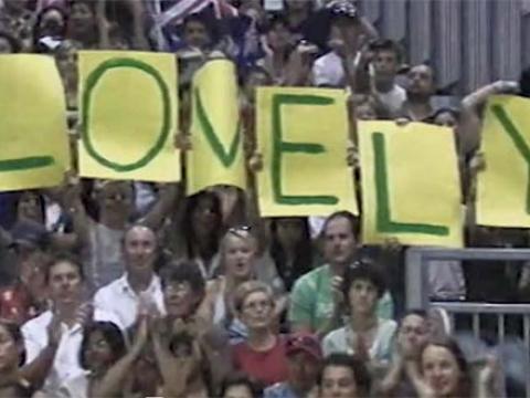 A banner in the crowd spells out LOVELY in support of Australian athlete Deborah Lovely at the 2006 Commonwealth Games