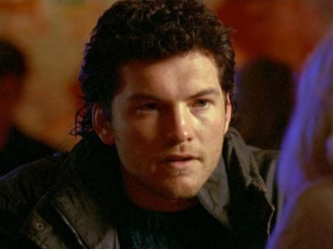 A man is looking at a woman intensely.