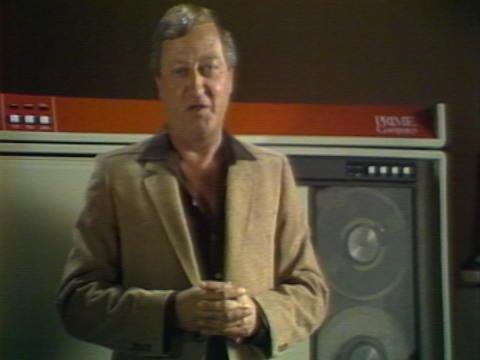 Graham Kennedy standing in front of a computer in an advertisement for the 1981 Australian census