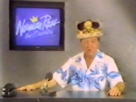 Graham Kennedy with a kings crown in an advertisement for Norman Ross