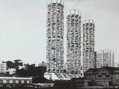 Three high rise buildings next to one another