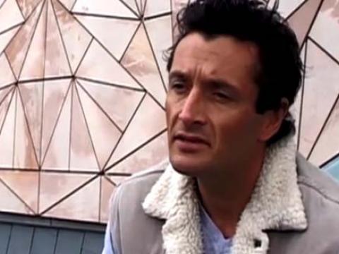 Former AFL player Glenn Manton being interviewed in Federation Square in Melbourne