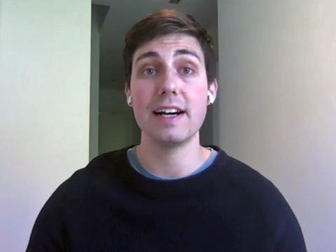 Head and shoulders shot of a man looking directly at the camera.