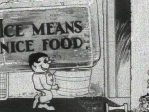 Animation of man holding a large block of ice on which is written 'Ice means nice food'