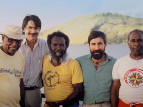 A group of men smiling to camera, Eddie 'Koiki' Mabo in the centre