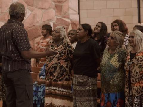 Indigenous women's choir rehearsing