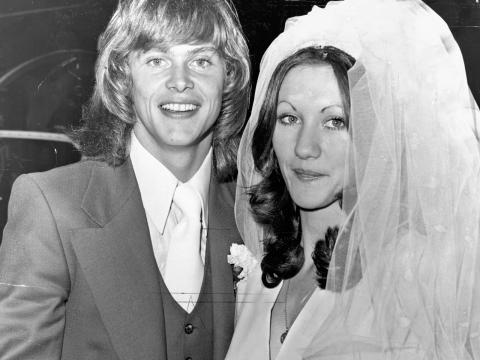 Singer John Farnham and his wife Jill Billman on their wedding day in April 1973. They are both looking at the camera and smiling.