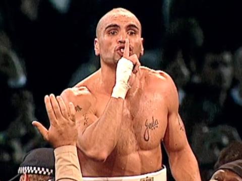Anthony Mundine in boxing gear silencing the crowd