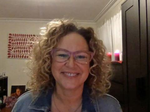 Leah Purcell smiling during an online interview