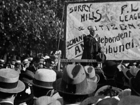 A group of people wearing hats at a protest during the Great Strike of 1917