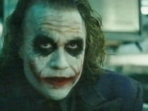 Close-up of Heath Ledger as The Joker in The Dark Knight, complete with pancake scary clown make-up.