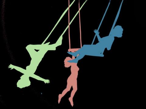 Colourful silhoettes of three animated female trapeze artists