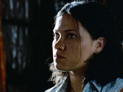 A woman's face in close-up in a scene from the short film Plains Empty