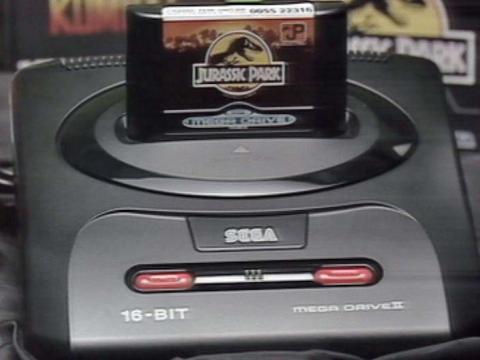 SEGA console with Jurassic Park game inserted.
