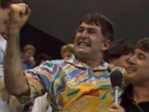 An excited Laurie Lawrence shakes his fist in triumph