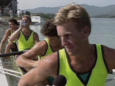 The Oarsome Foursome being interviewed while in their boat
