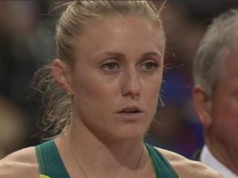 Big close up of Sally Pearson focussing on her race
