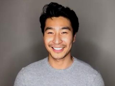 Actor Chris Pang pictured from the shoulders up smiling at camera