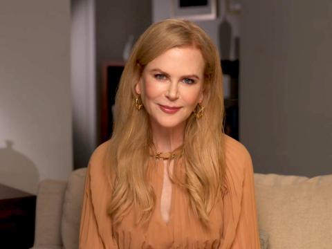 Actor Nicole Kidman pictured from the shoulders up, smiling at camera.