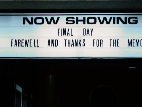 A cinema hoarding that reads 'Now Showing – Final Day – Farewell and Thanks for the Memories'