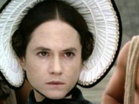 Close up of a woman in a bonnet