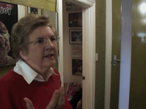 Filmmaker Patricia Edgar gives an interview in her house