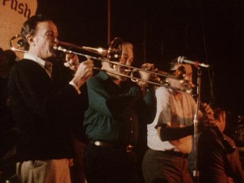 Jazz musicians playing brass instruments in a pub in The Rocks in Sydney