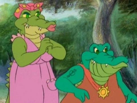 Cartoon crocodiles wearing clothes. One with a medallion and tattoo.