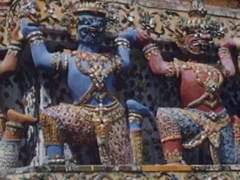 Colourful sculptures of figures on a Thai temple