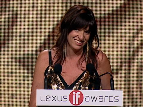 Director Cate Shortland is accepting an award. There is a podium in front of her that reads 'Lexus IF Awards'.