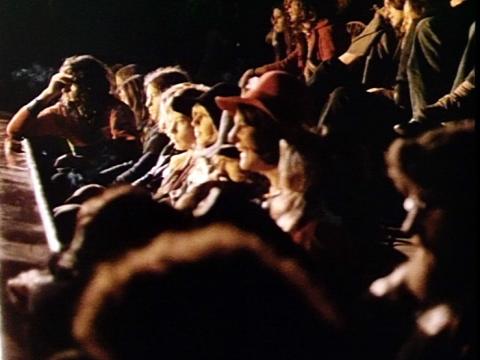A crowd of people watch a concert at the TF Much Ballroom in Melbourne