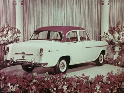 A Holden FE surrounded by flowers